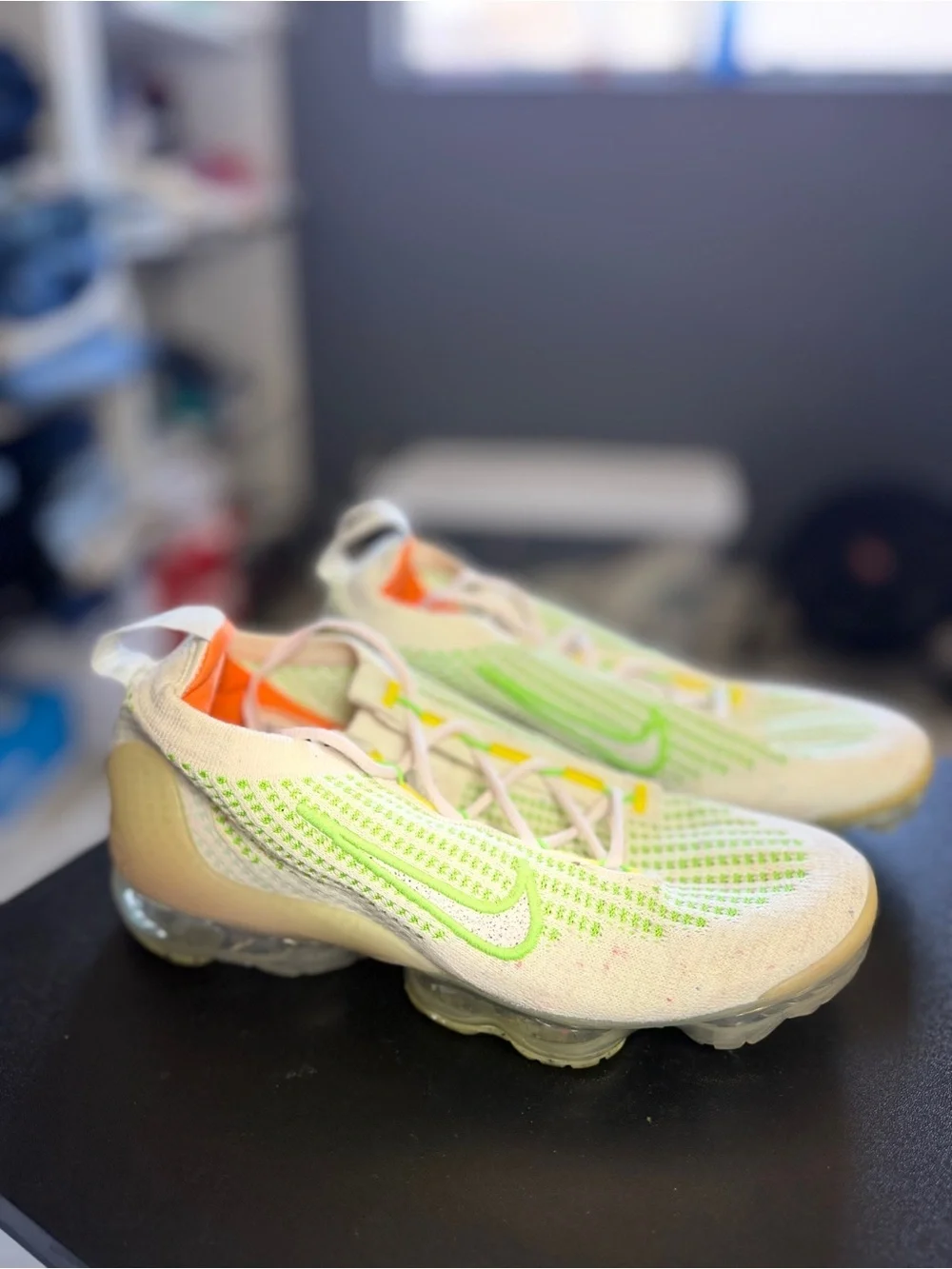Nike White Sneakers with Neon Green and Orange Accents